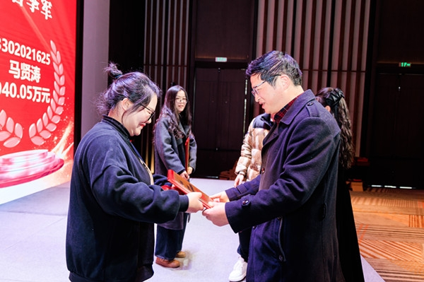 宁波体彩举行先进实体店表彰会暨大乐透派奖培训