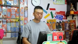 从修车匠到体彩人：党员秦小明的公益长征