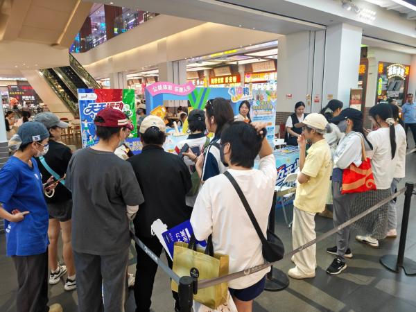 “双城”联动 秋启好运 海南体彩公益品牌宣传活动走进海口商圈